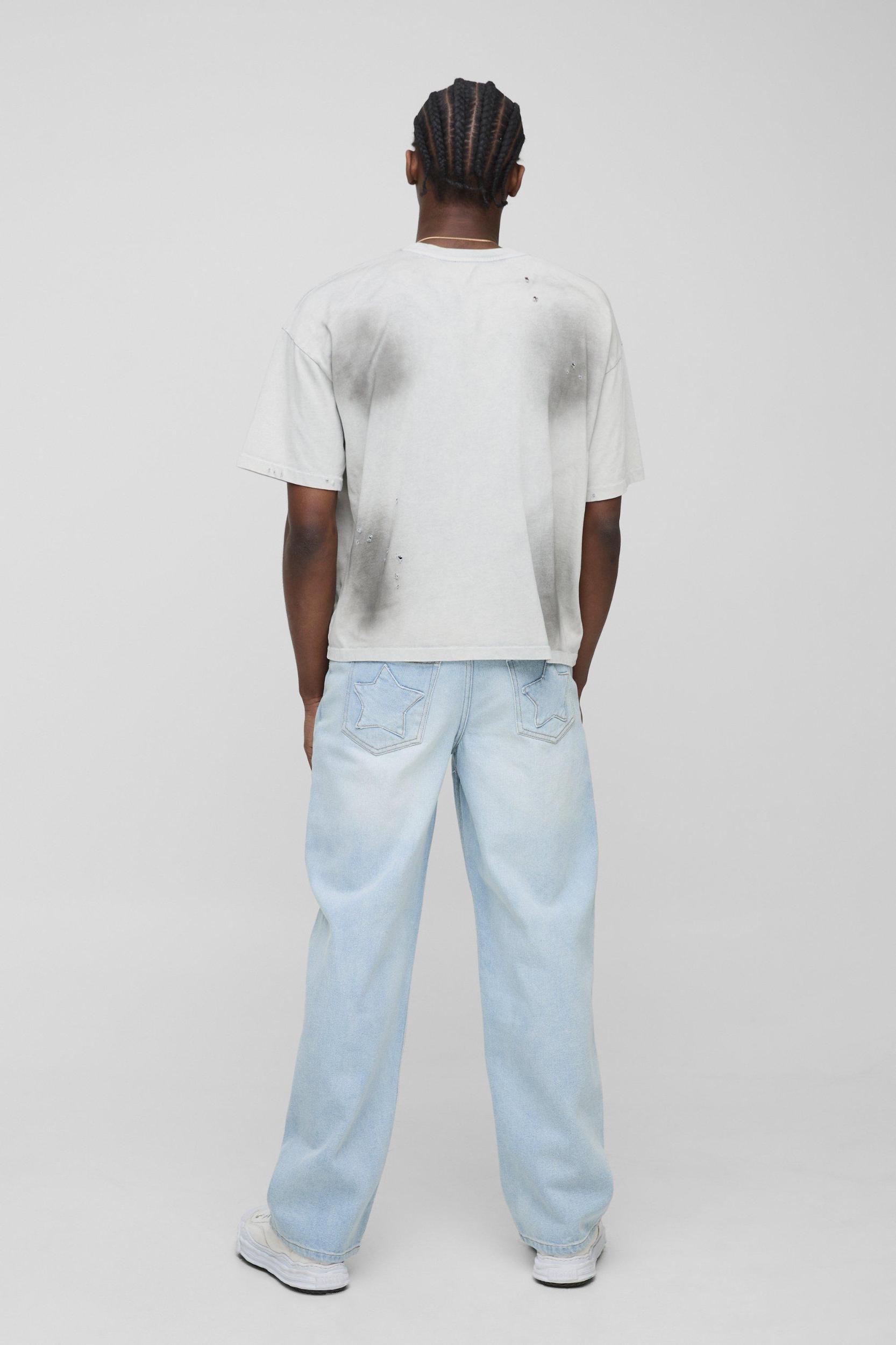 Embroidered Star Pocket Detail Relaxed Fit Jeans | boohooMAN USA Product Image