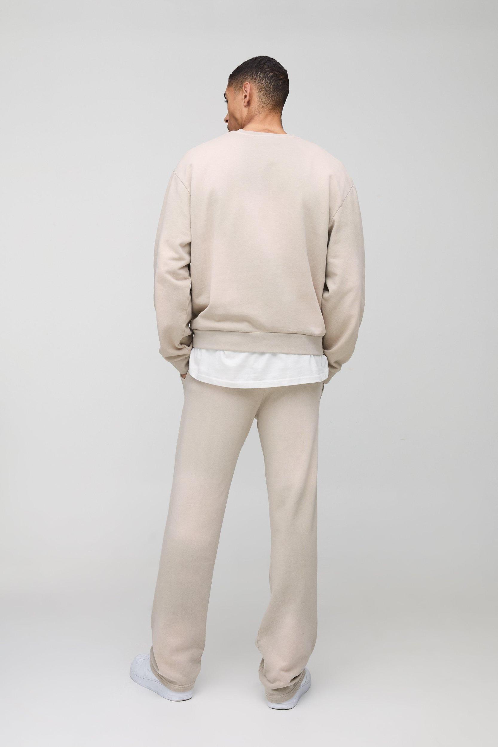 Relaxed Fit Spray Wash Ofcl Printed Sweatpants | boohooMAN USA Product Image