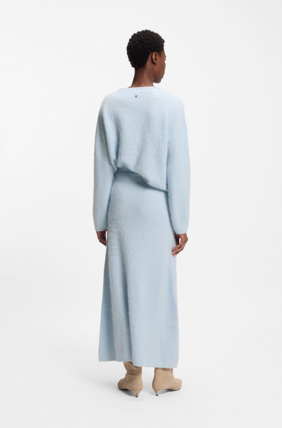 Knitted skirt with logo charm Product Image