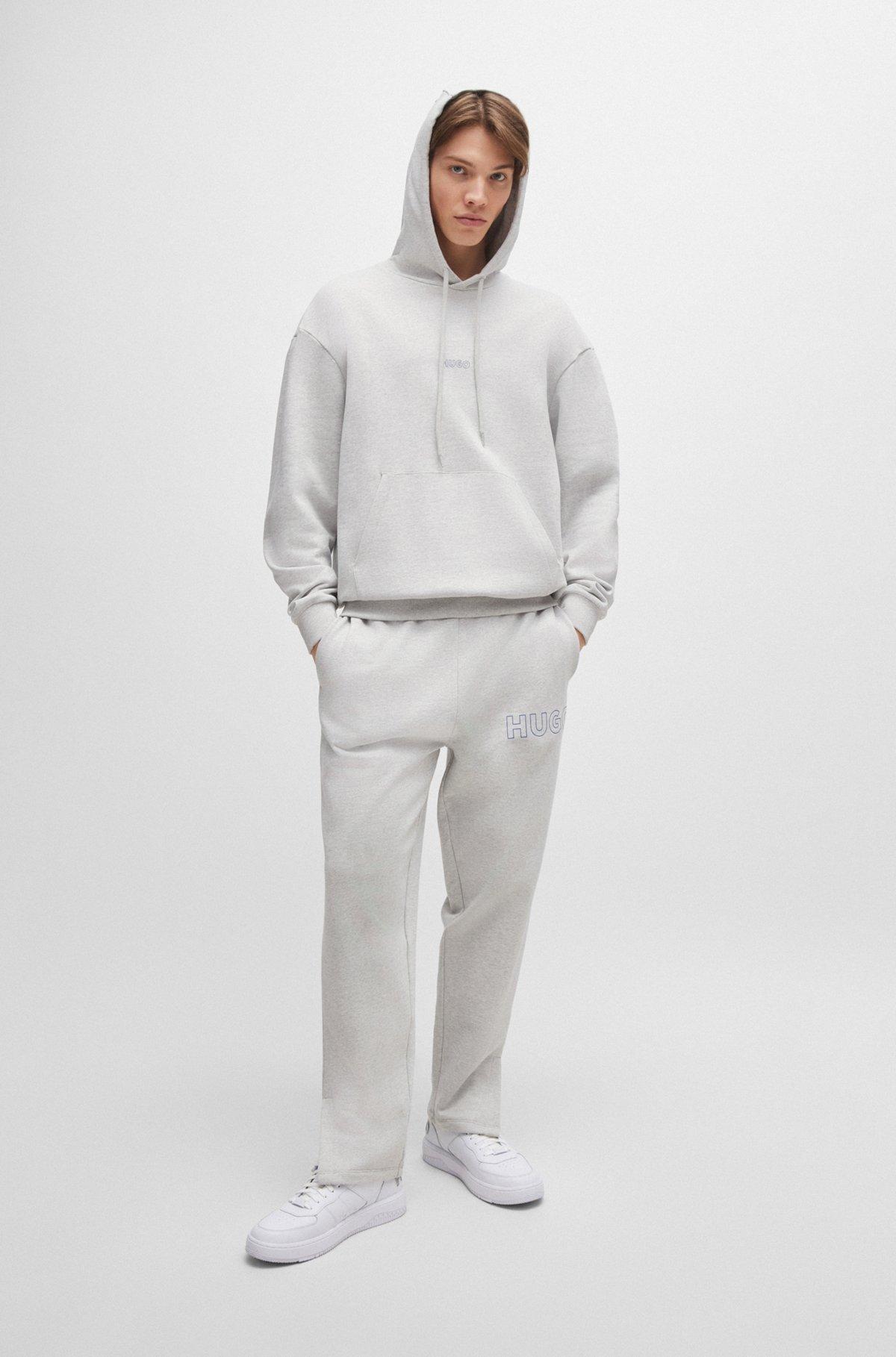 Loose-fit cotton-terry tracksuit bottoms with outline logo Product Image
