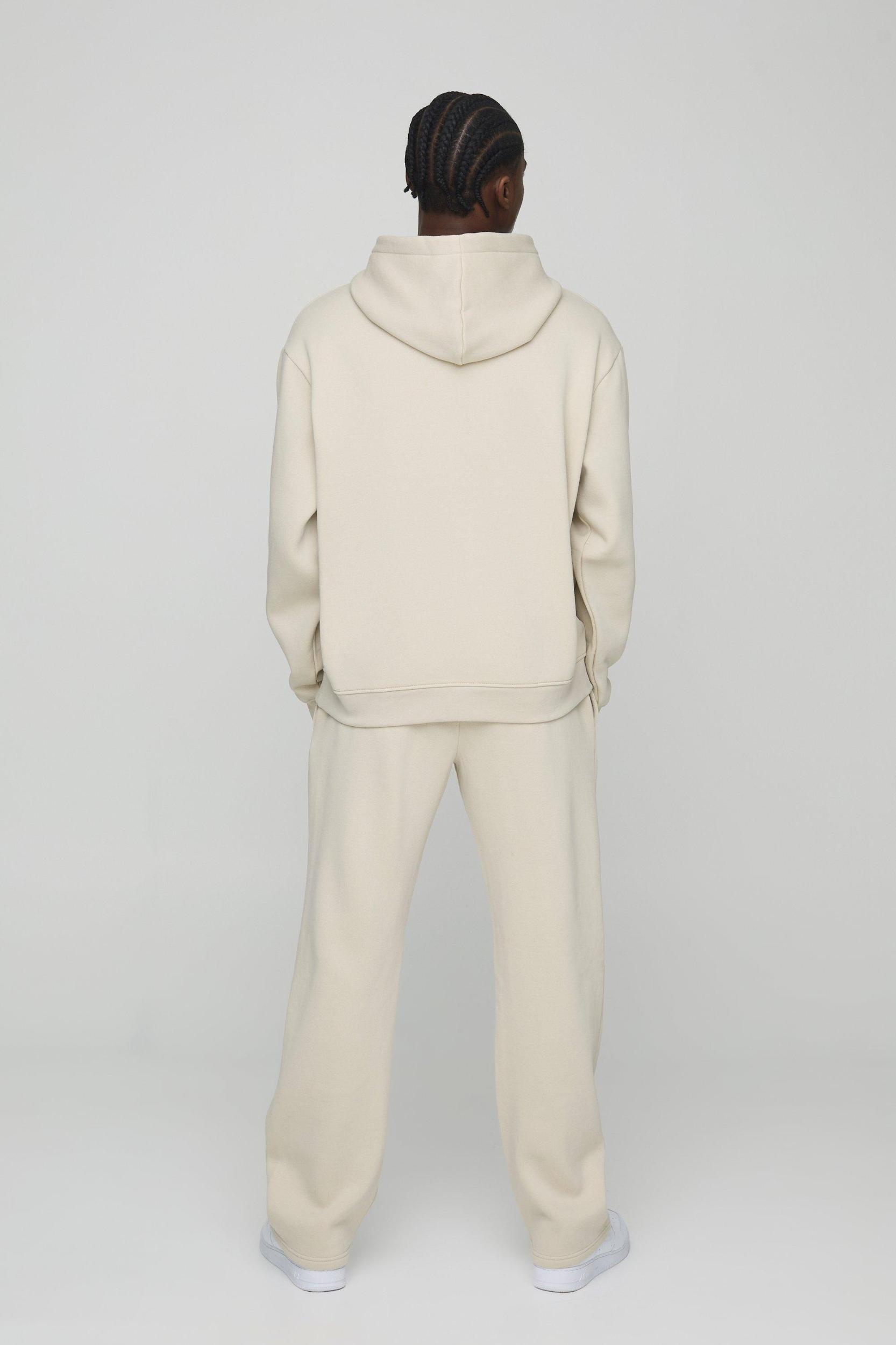 Oversized Homme Debossed Hooded Tracksuit | boohooMAN USA Product Image