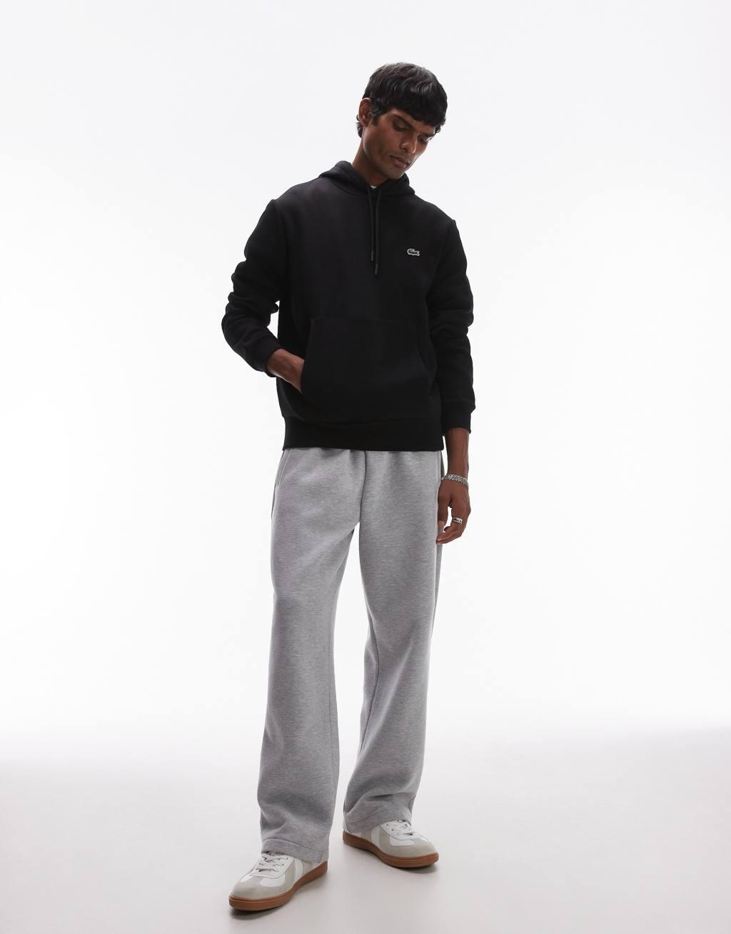 Lacoste pull over hoodie in black  Product Image