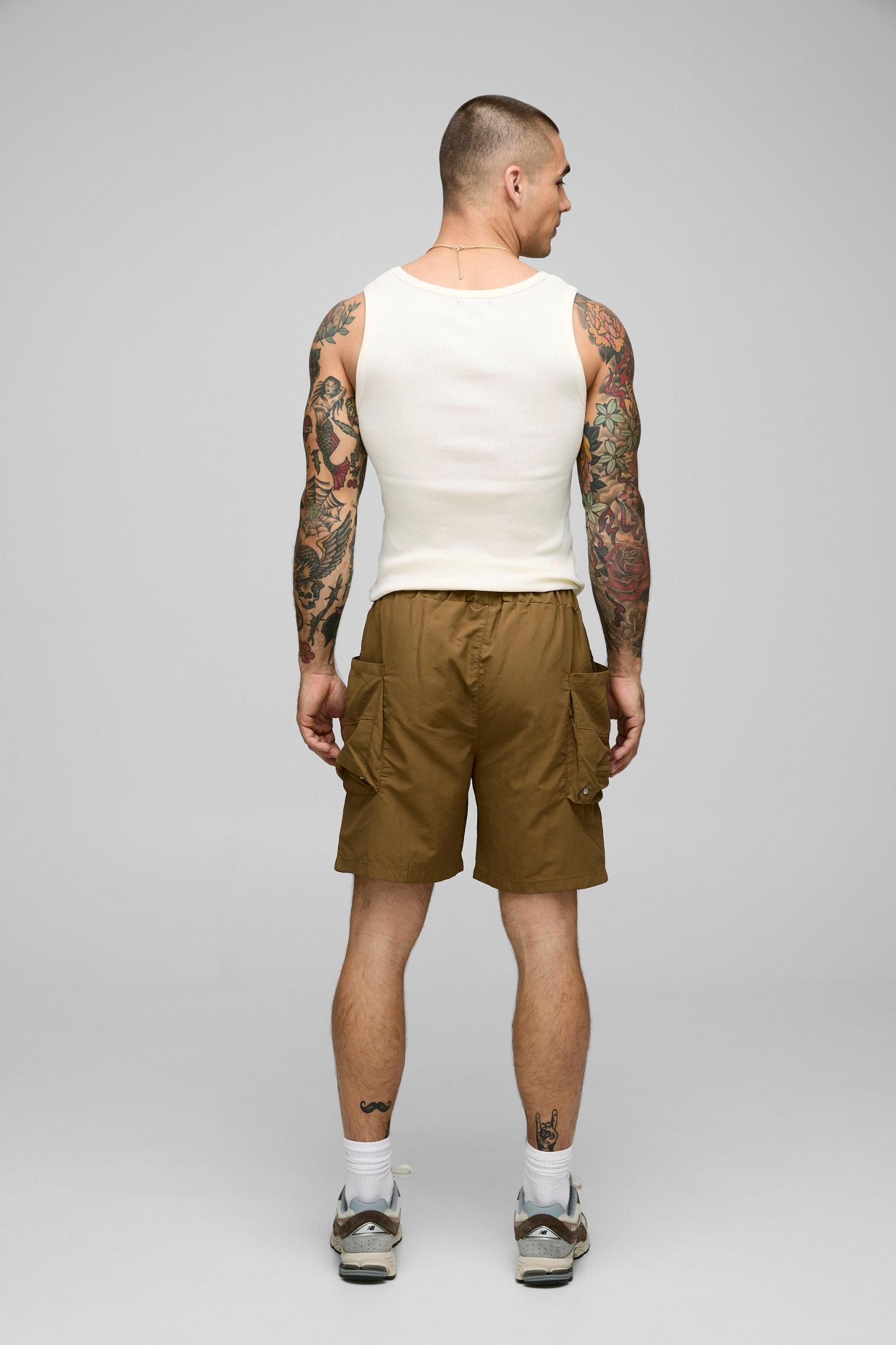 Elasticated Waist Relaxed Crinkle Nylon Cargo Shorts | boohooMAN USA Product Image