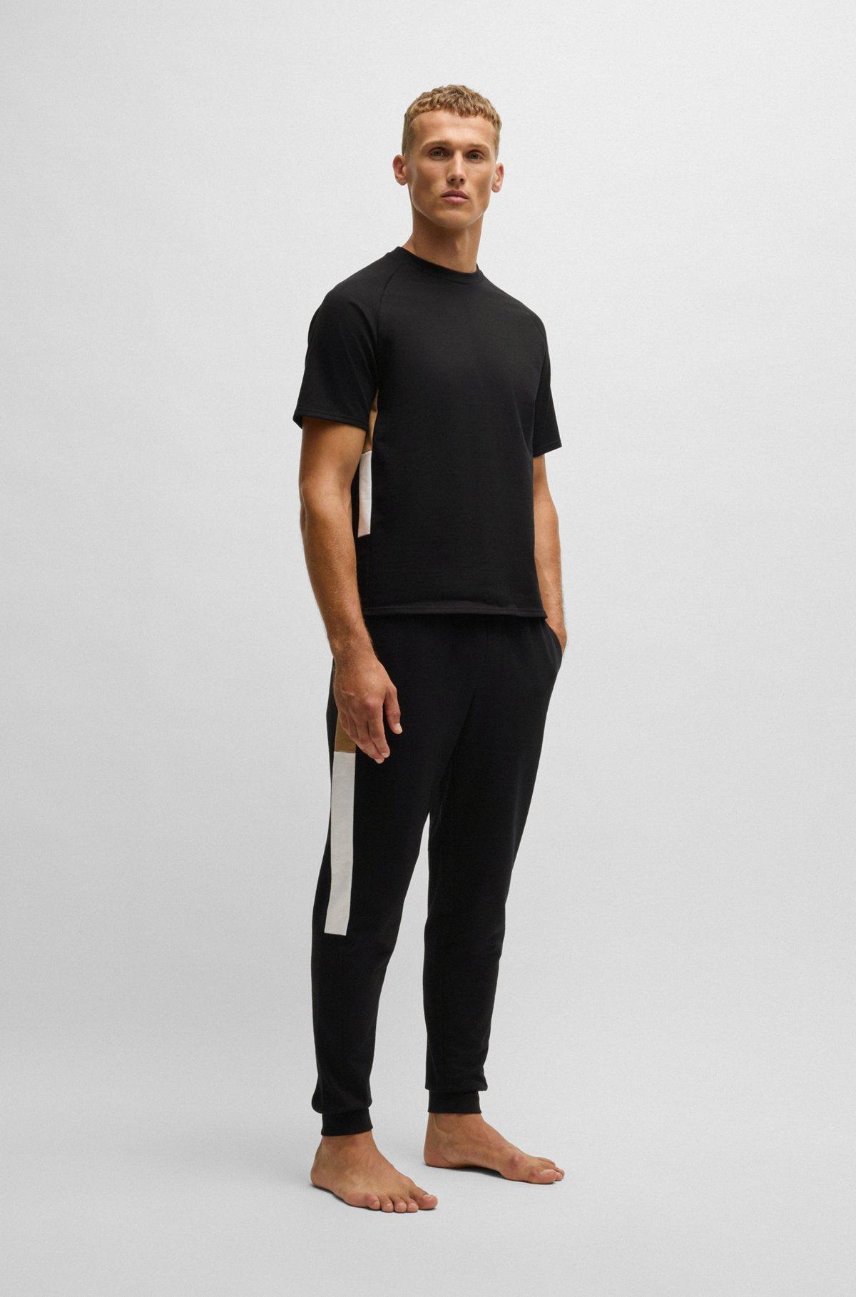 Cotton-terry tracksuit bottoms with contrast side panels Product Image
