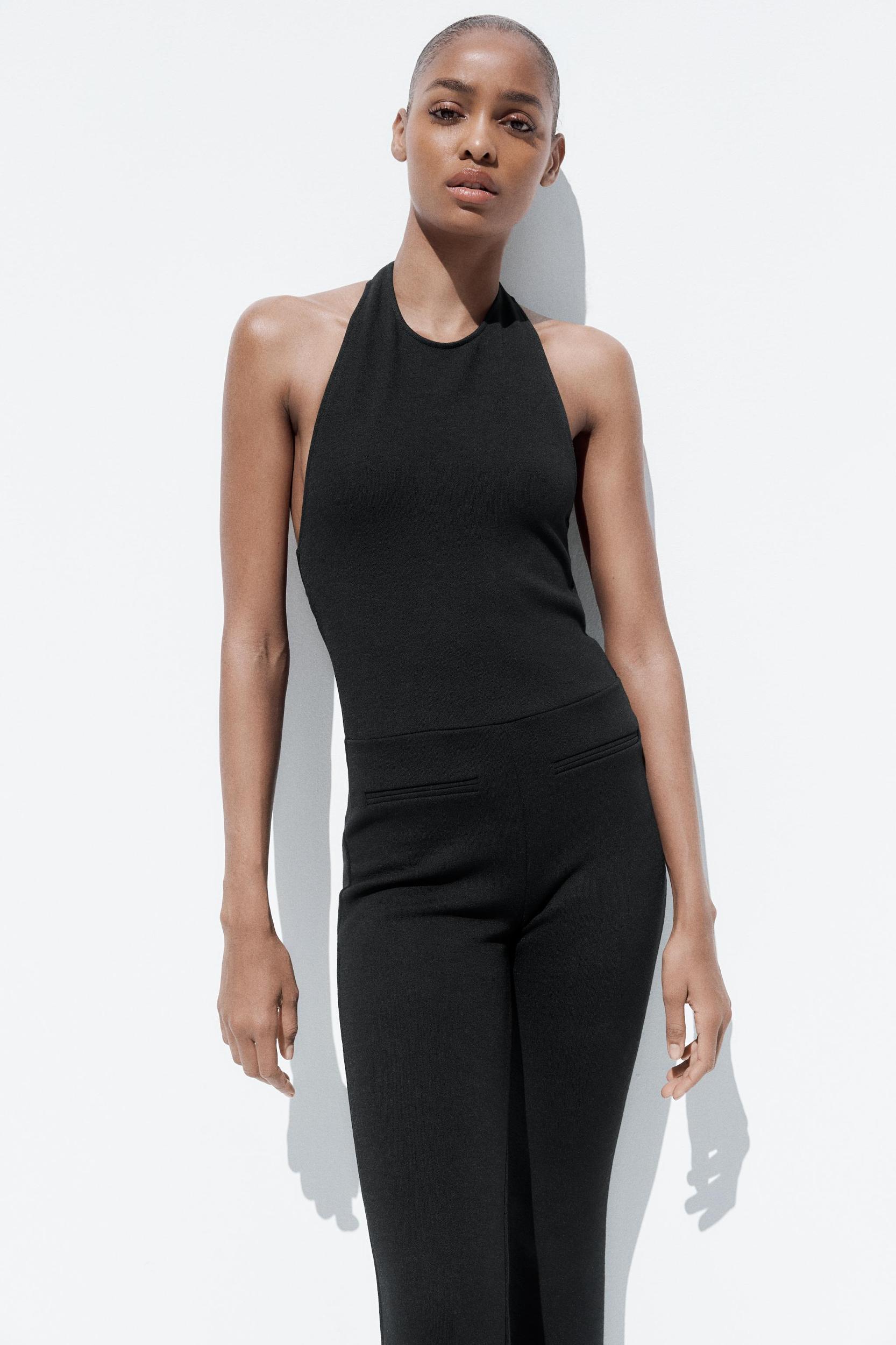 HALTER FLARE STRETCH JUMPSUIT Product Image