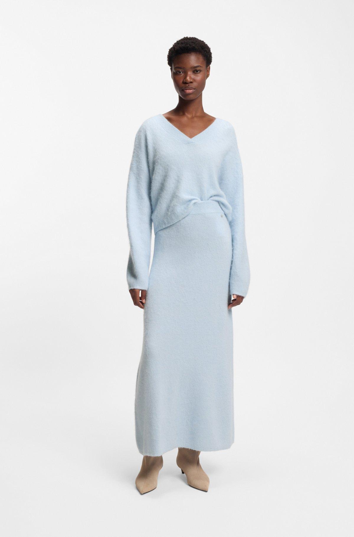 Knitted skirt with logo charm Product Image