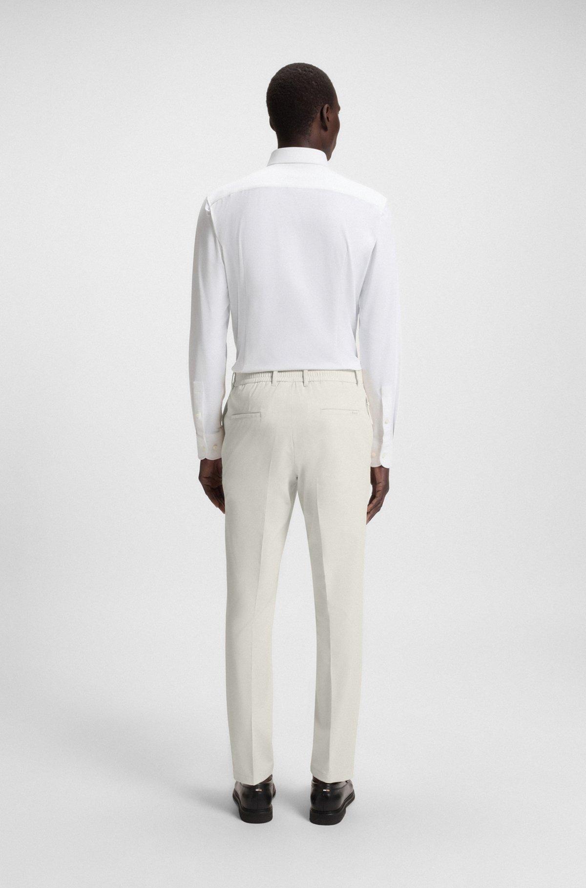 Packable slim-fit trousers in performance-stretch fabric Product Image