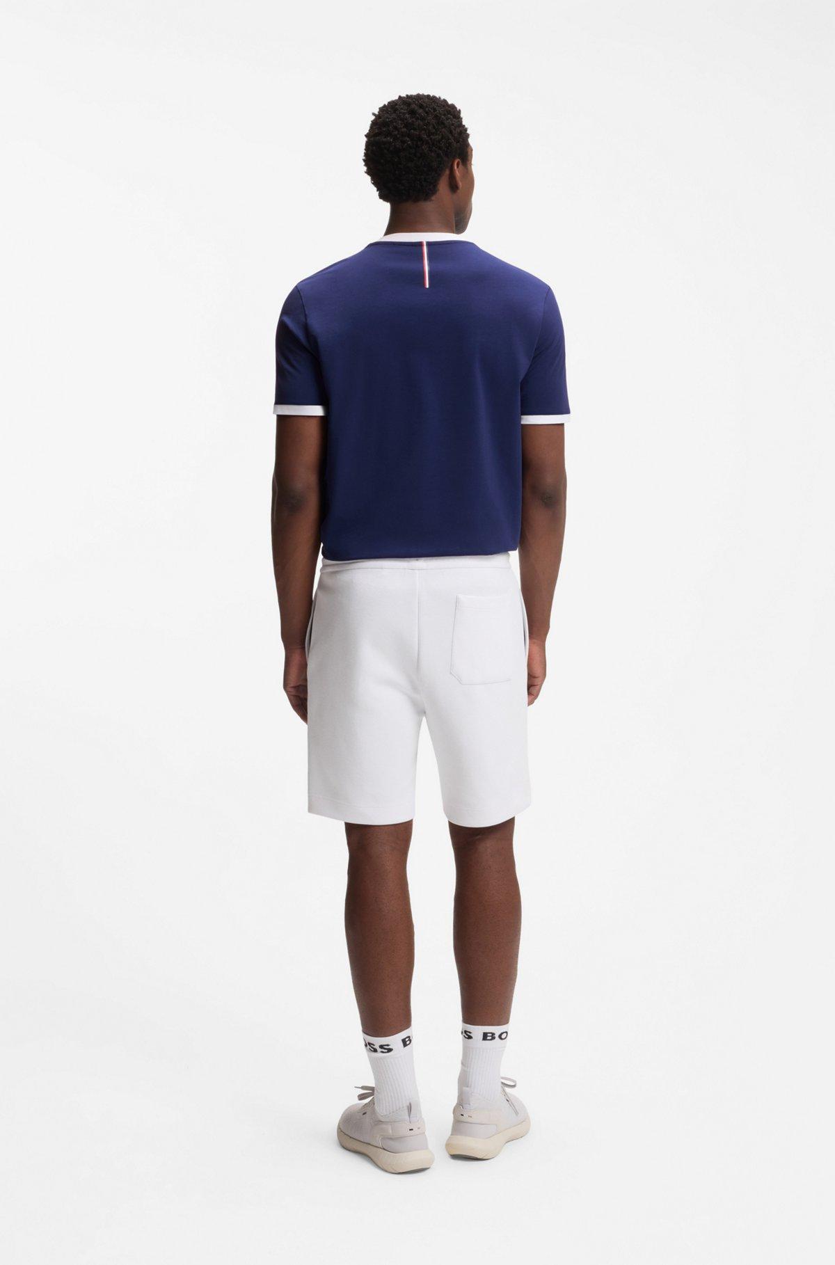 Striped-trim polo shirt in mercerised cotton Product Image