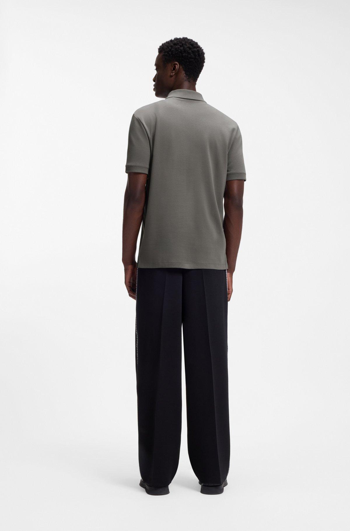 Contrast-logo polo shirt in cotton piqué Product Image