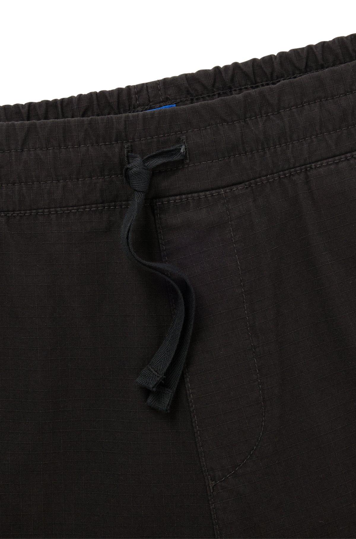 Tapered-fit tracksuit bottoms in ripstop cotton Product Image
