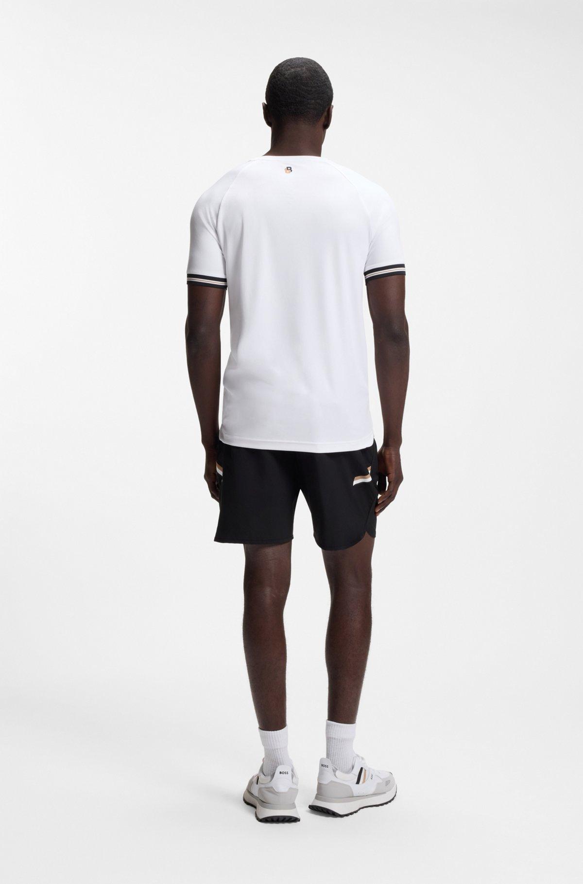 Active slim-fit T-shirt with tennis-ball embossing Product Image