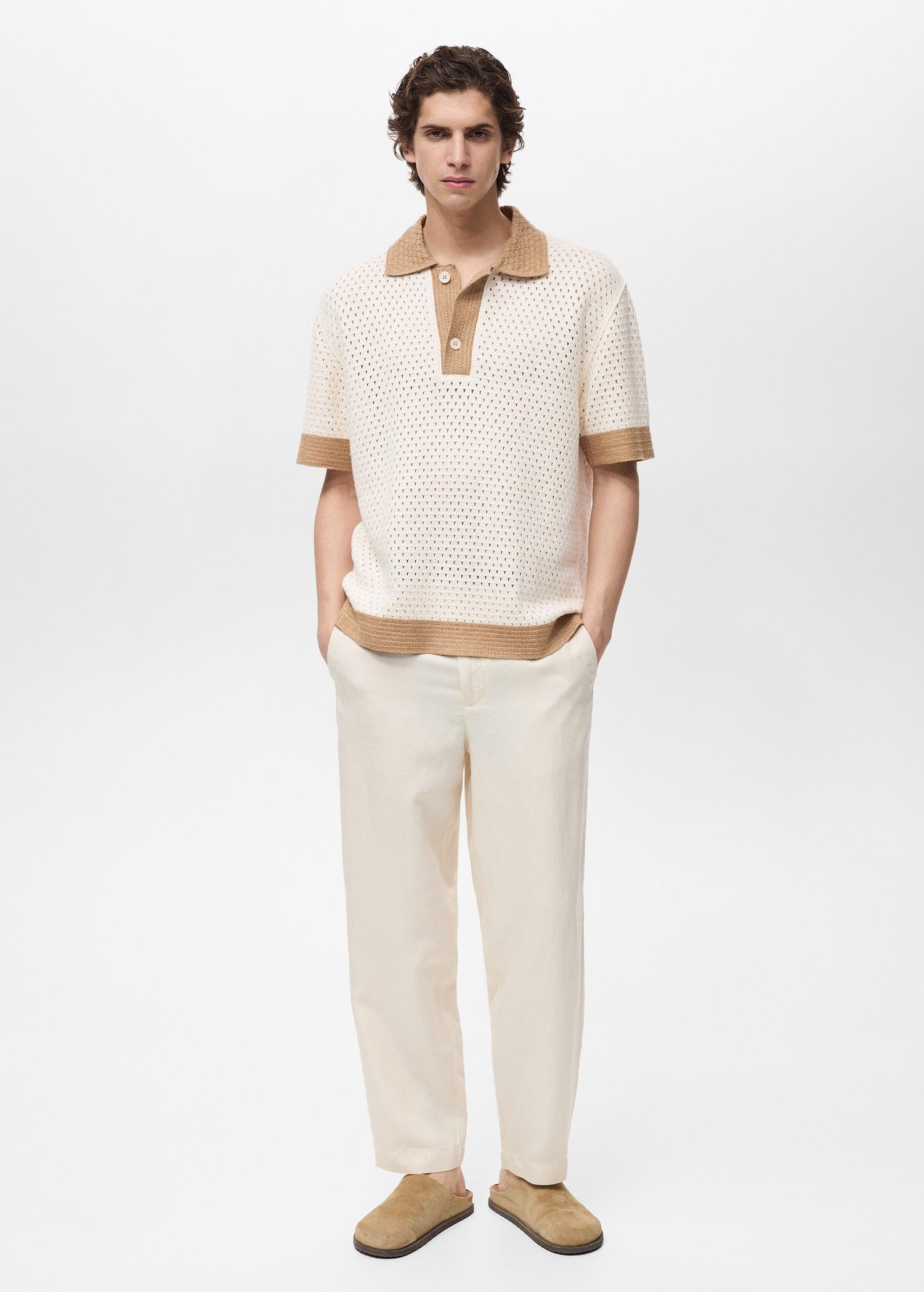 Openwork knitted polo shirt with contrasting details - Men | MANGO USA Product Image