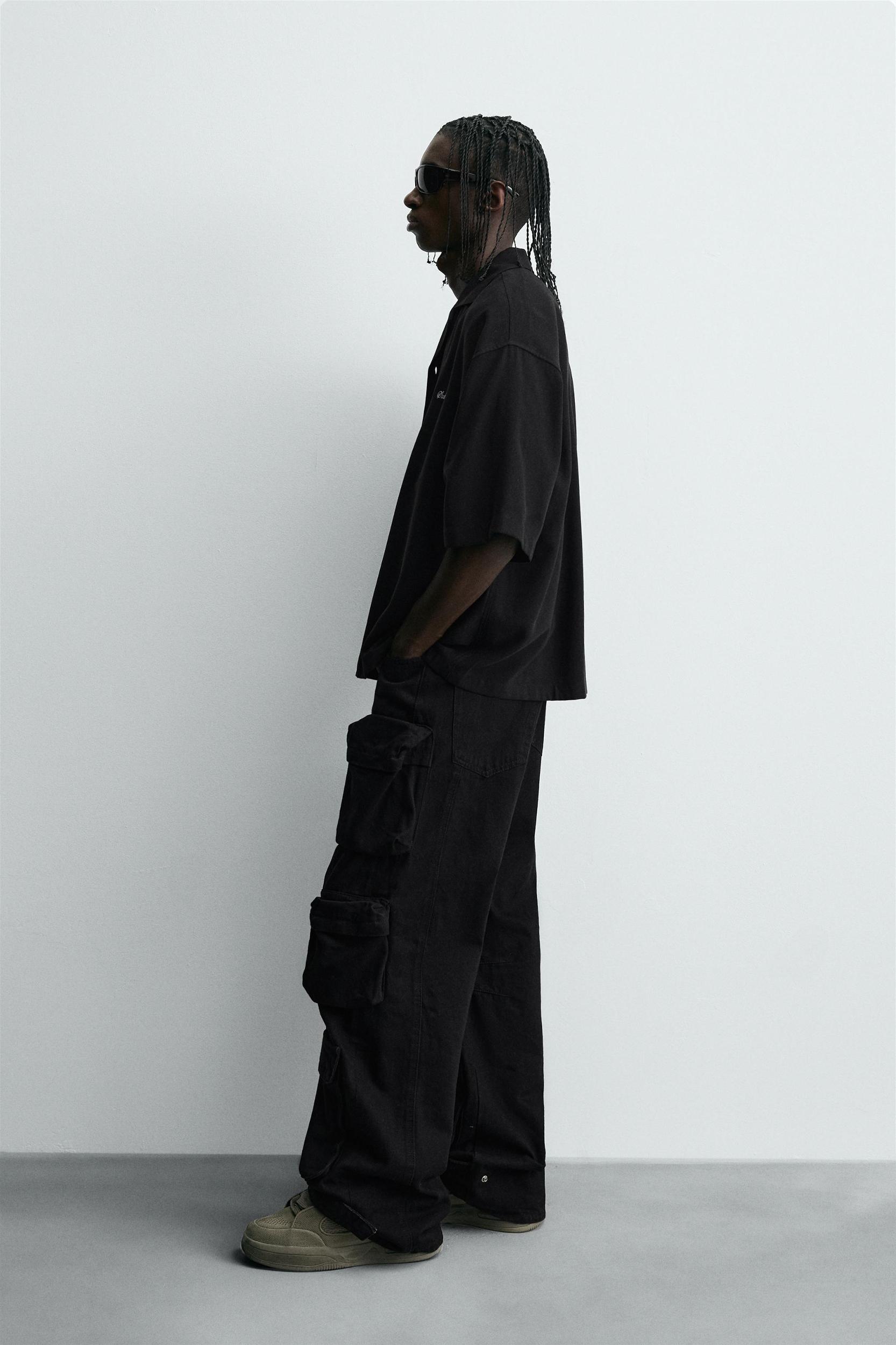 FLOWY SHIRT WITH EMBROIDERED TEXT Product Image