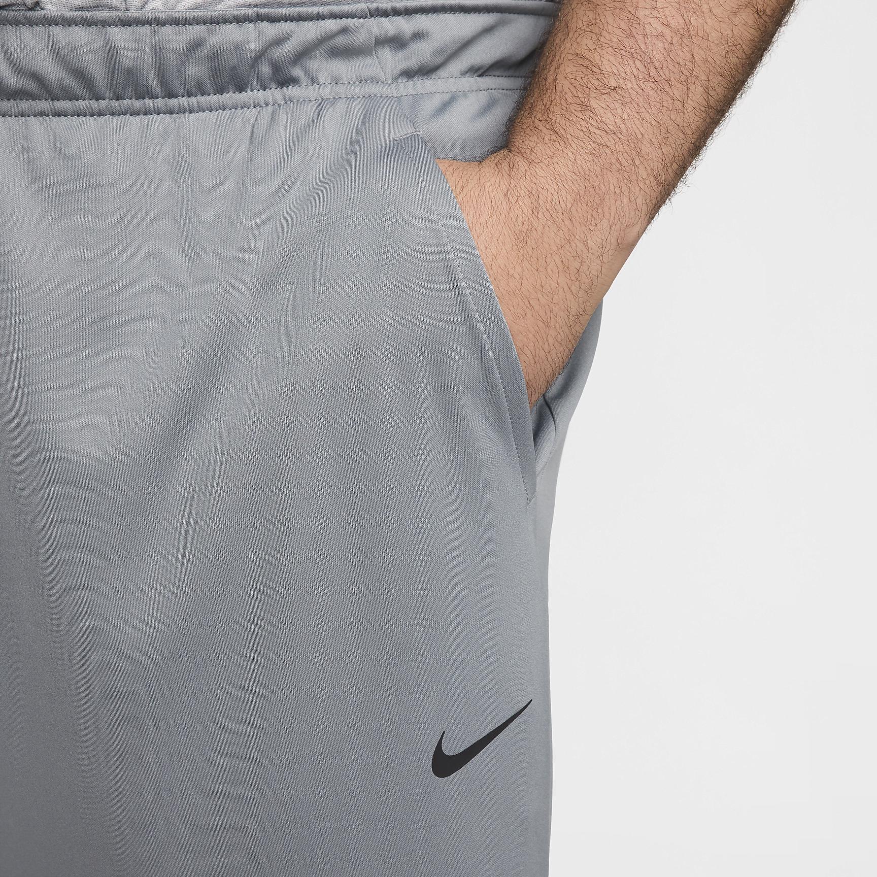 Nike Mens Totality Dri-FIT Tapered Versatile Pants | FB7509-084 Product Image