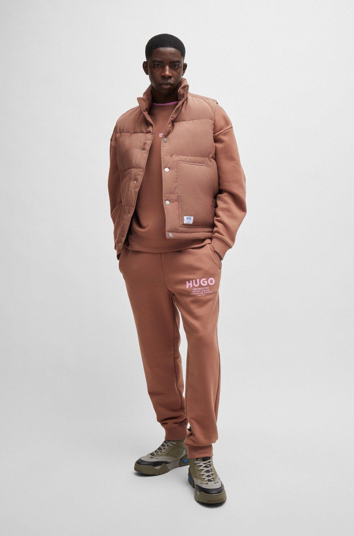 Cotton-terry tracksuit bottoms with logo print Product Image