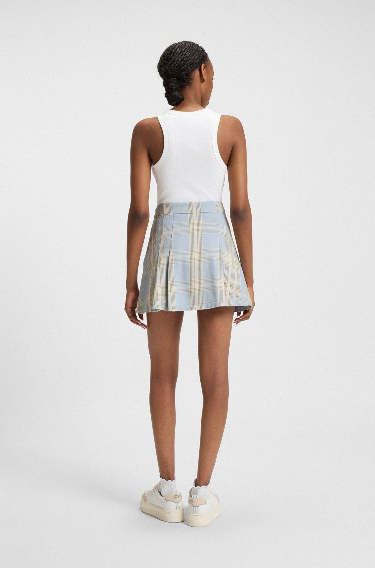 Pleated mini skirt in checked cotton twill Product Image