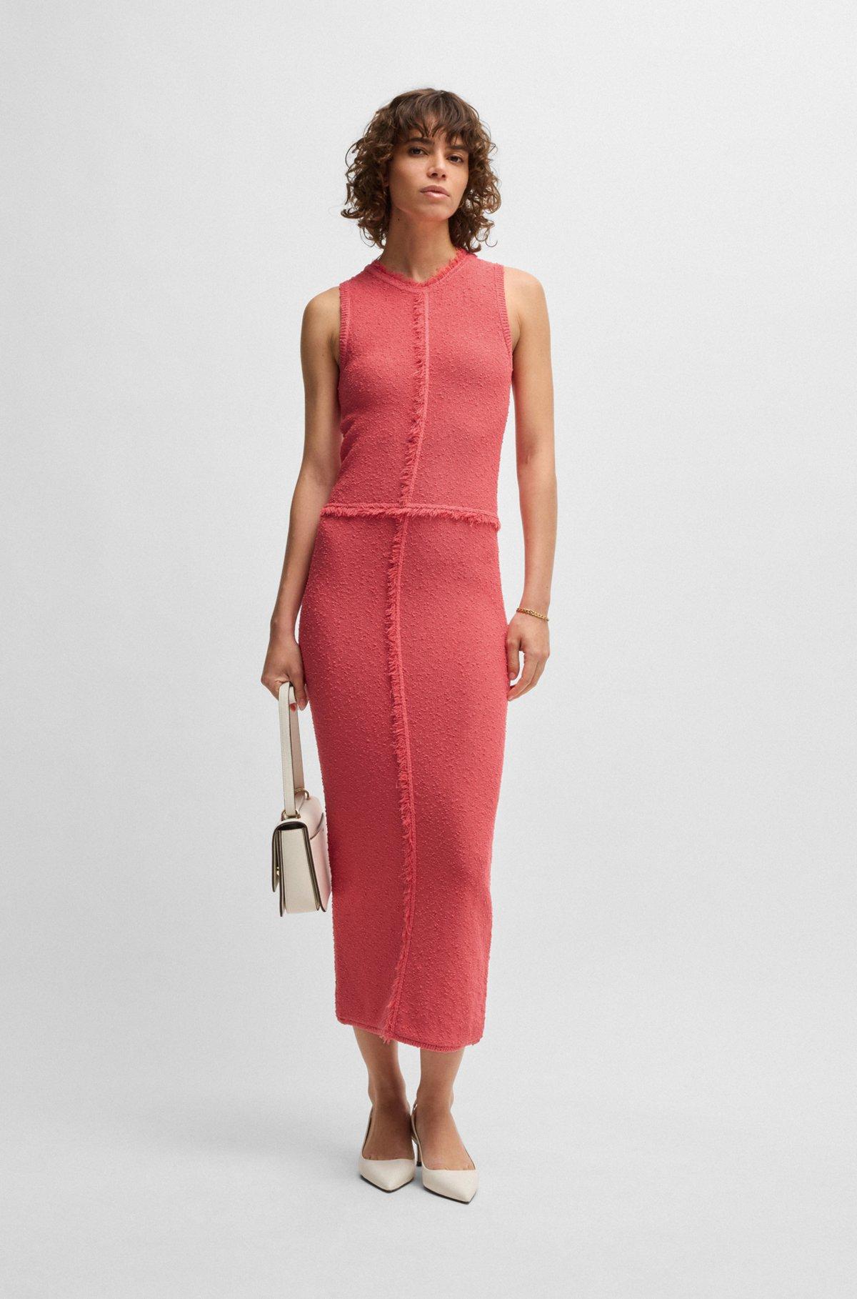 Sleeveless knitted dress with fringe trims Product Image