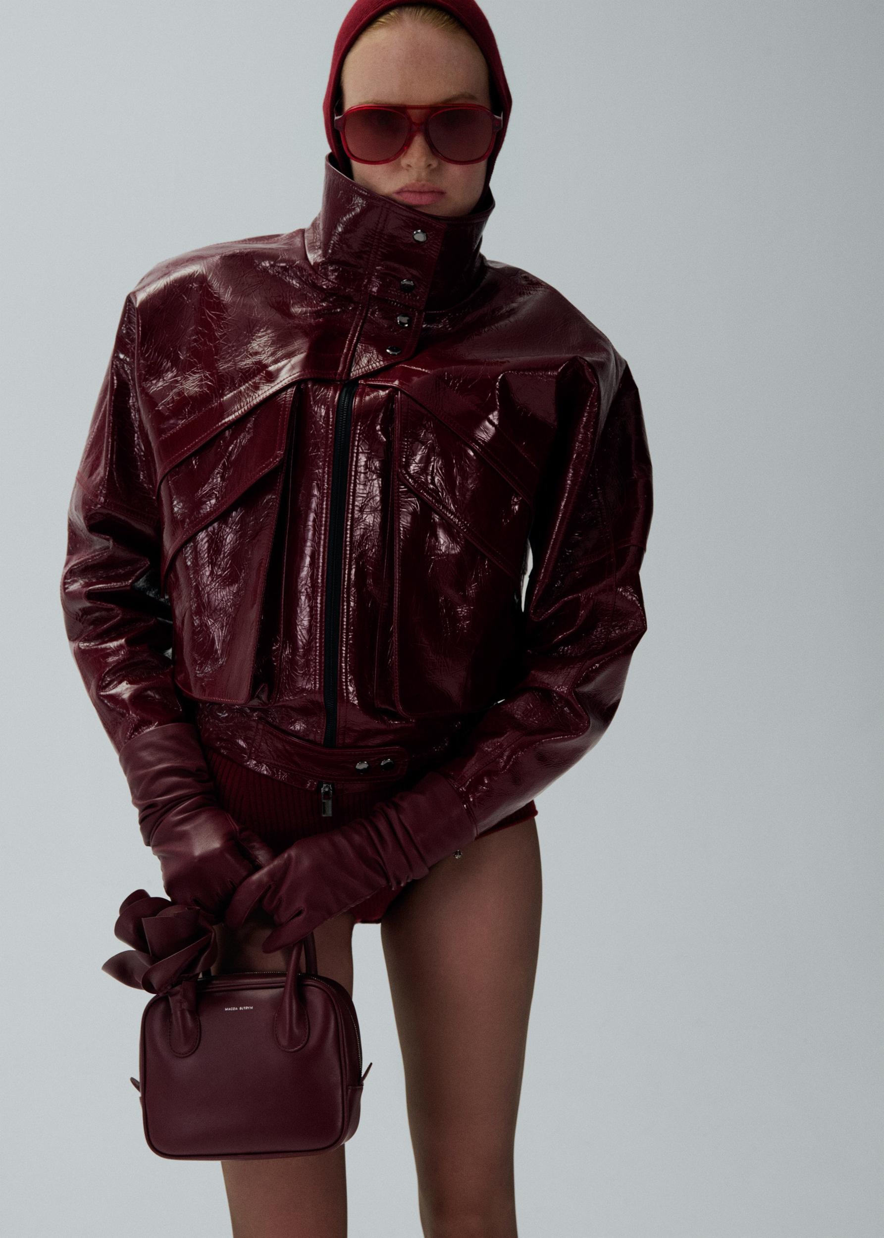 Vintage patent leather bomber jacket in bordeaux Product Image