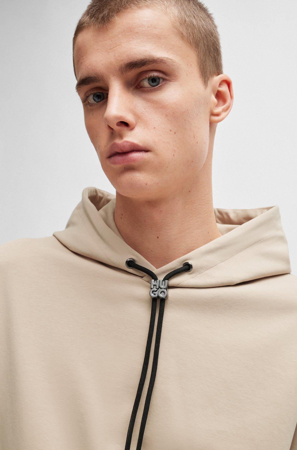 Relaxed-fit hoodie in stretch cotton with contrast pocket Product Image