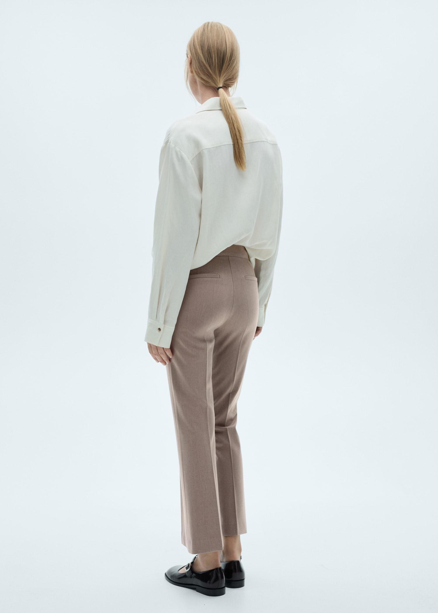 Flared flowing pants - Women | MANGO USA Product Image