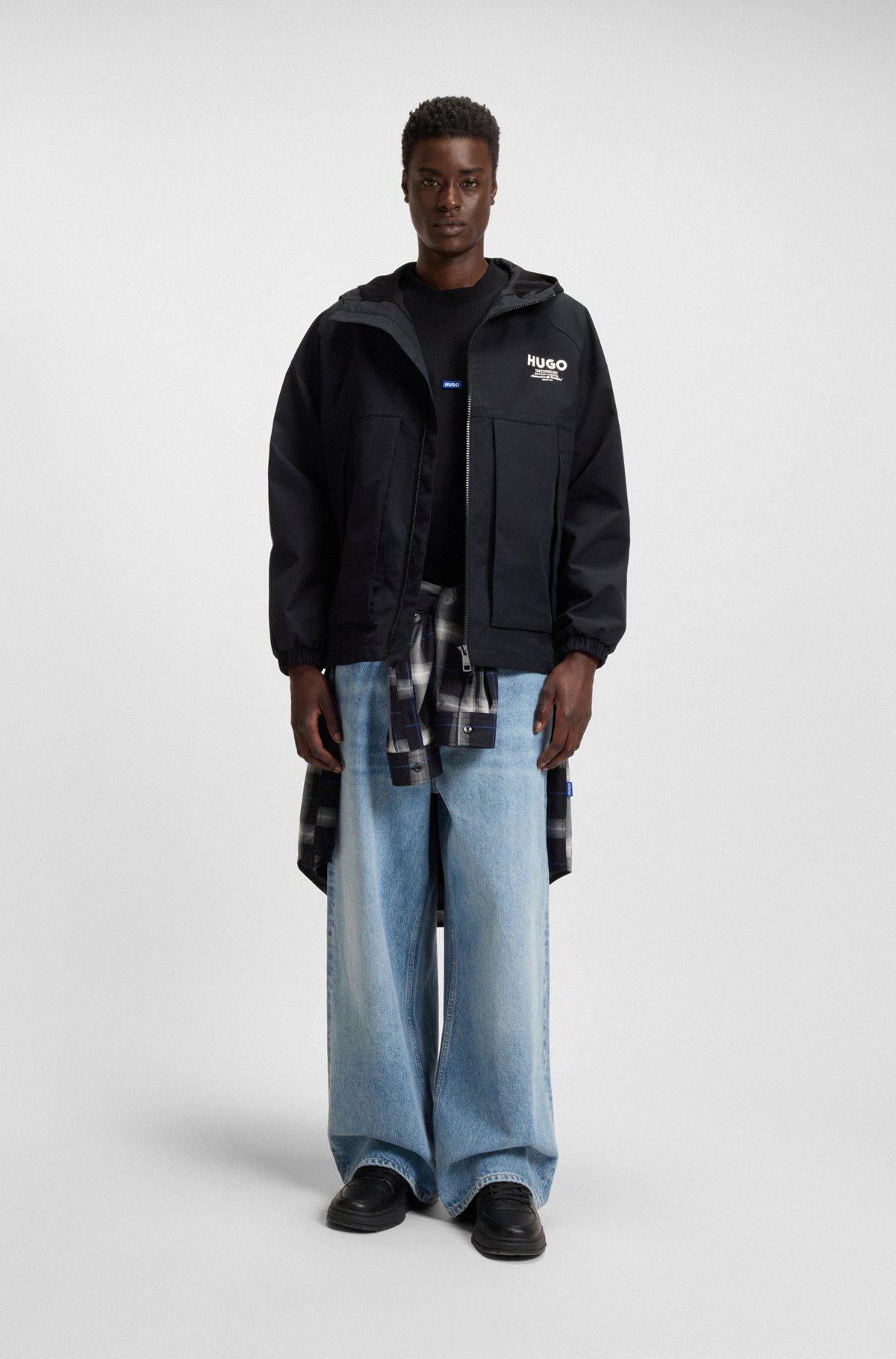 HUGO - Regular-fit cotton-jersey T-shirt with blue logo patch - Black Product Image