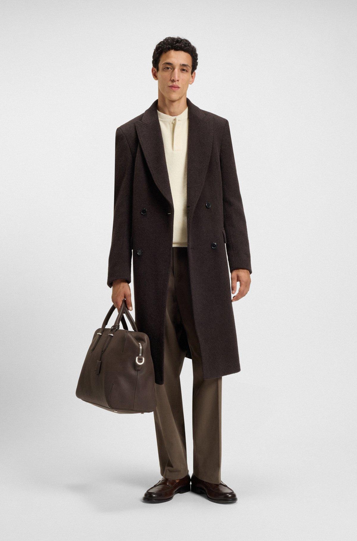 Grained-leather holdall with embossed logo Product Image