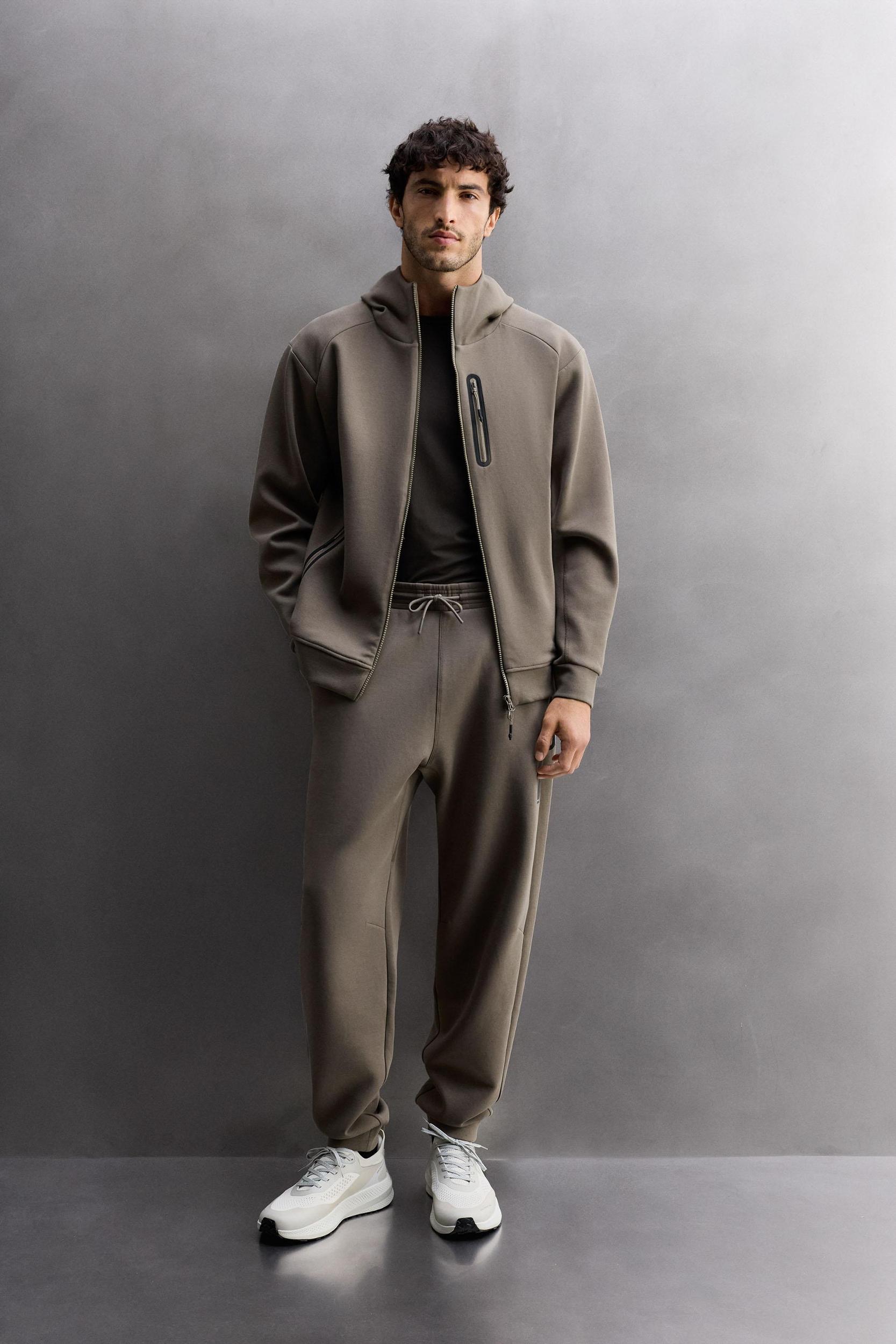 TECHNICAL ZIP-UP HOODIE Product Image