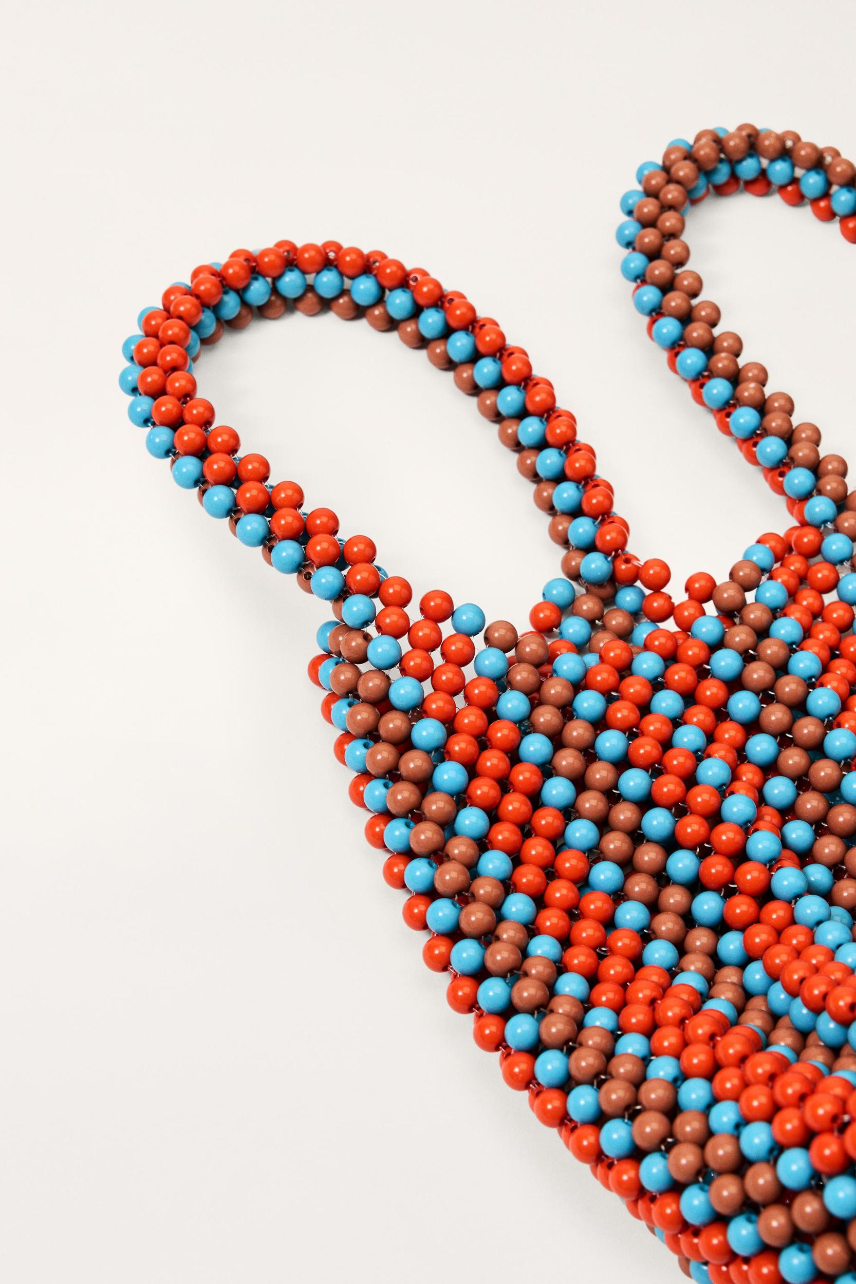 LIMITED EDITION STRIPED WIDE-LEG PANTS Product Image