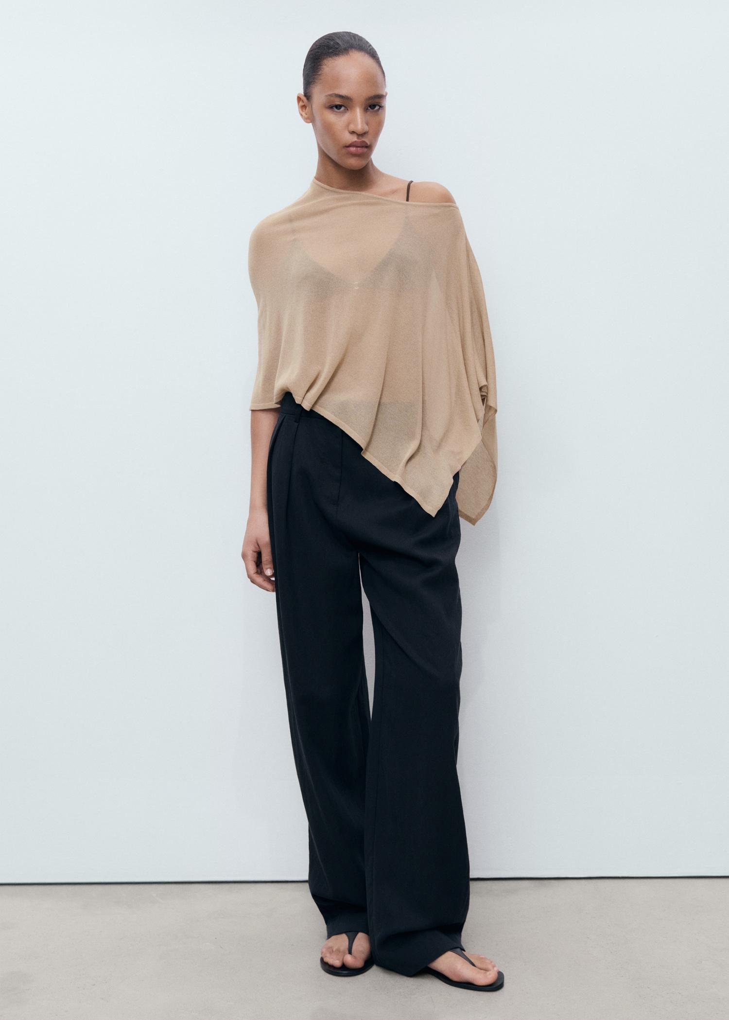 Asymmetrical knitted cape - Women | MANGO USA Product Image