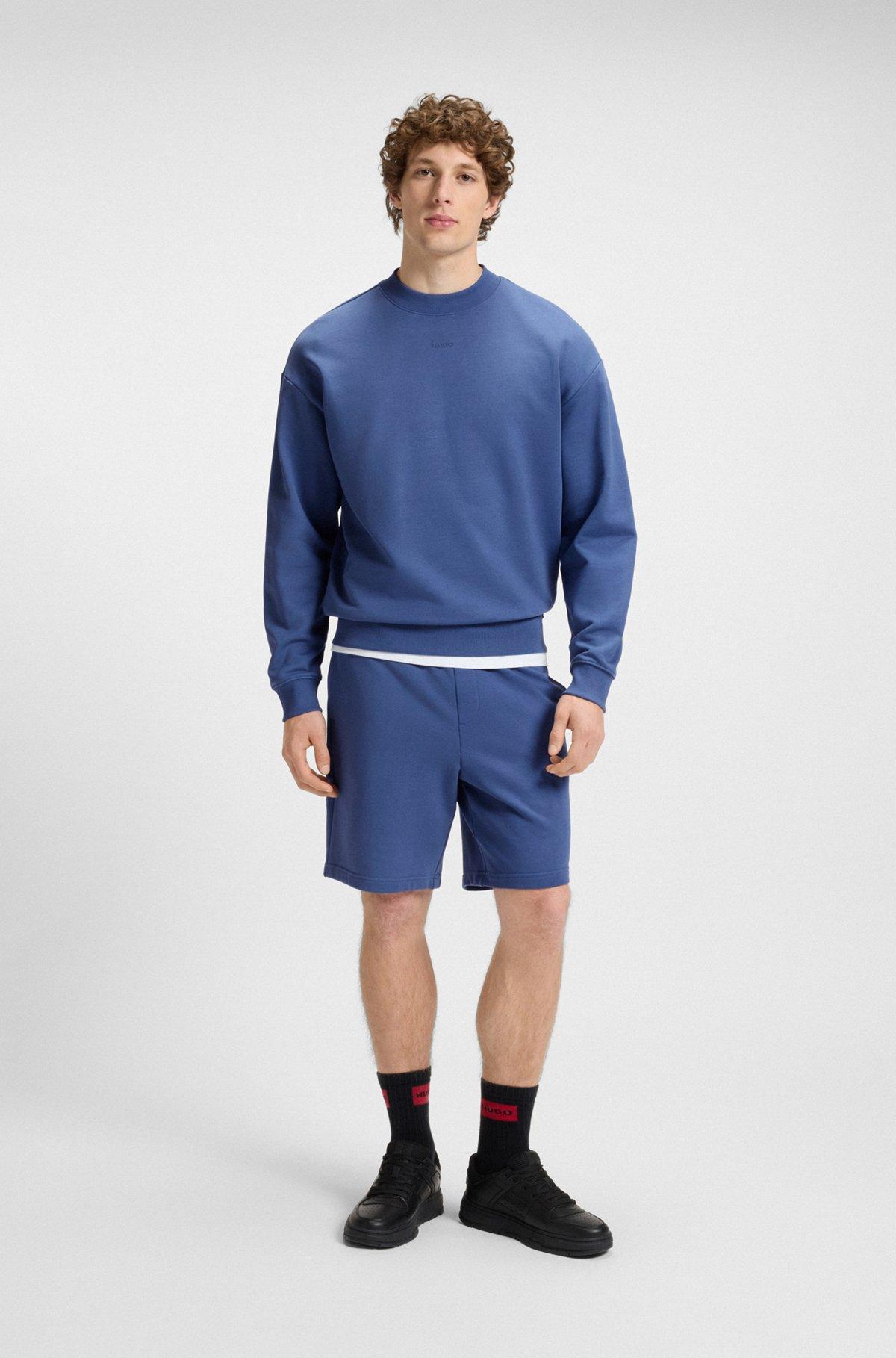 HUGO - Relaxed-fit shorts in cotton terry with logo print - Blue Product Image