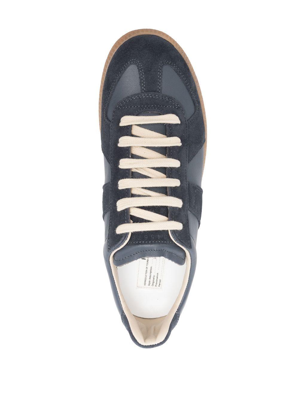 Replica low-top leather sneakers Product Image