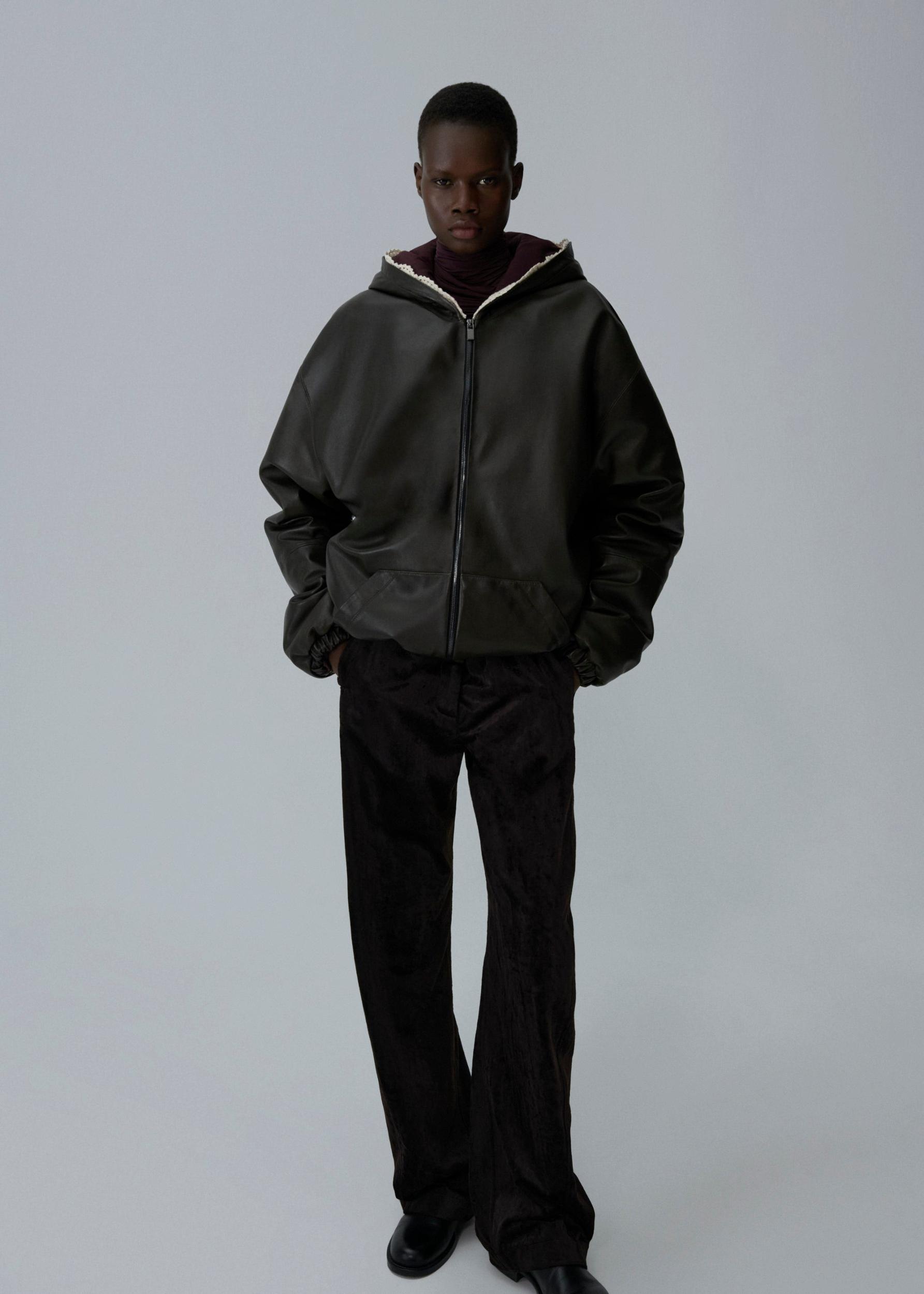 Lace-detail zip up hoodie in black leather Product Image