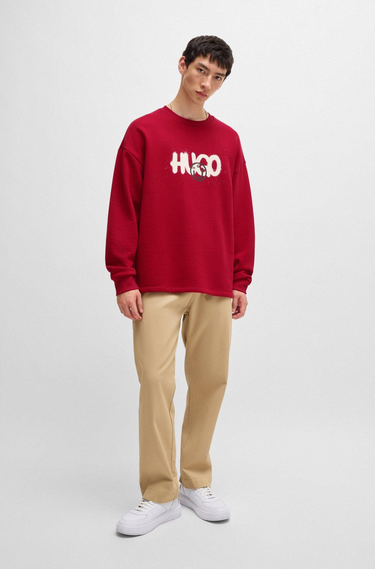 Cotton-terry sweatshirt with Happy HUGO logo Product Image