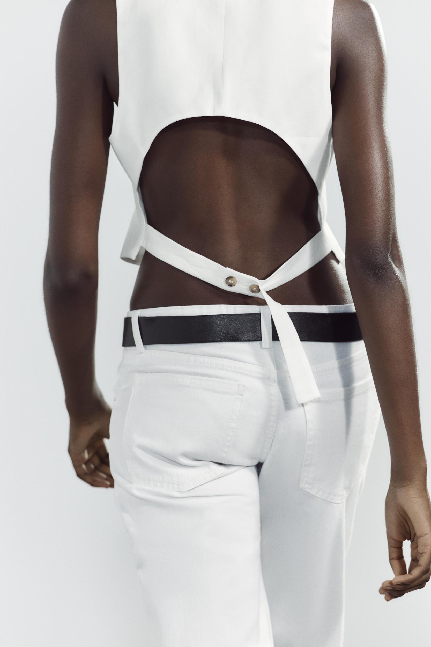 BACK CUT OUT VEST Product Image