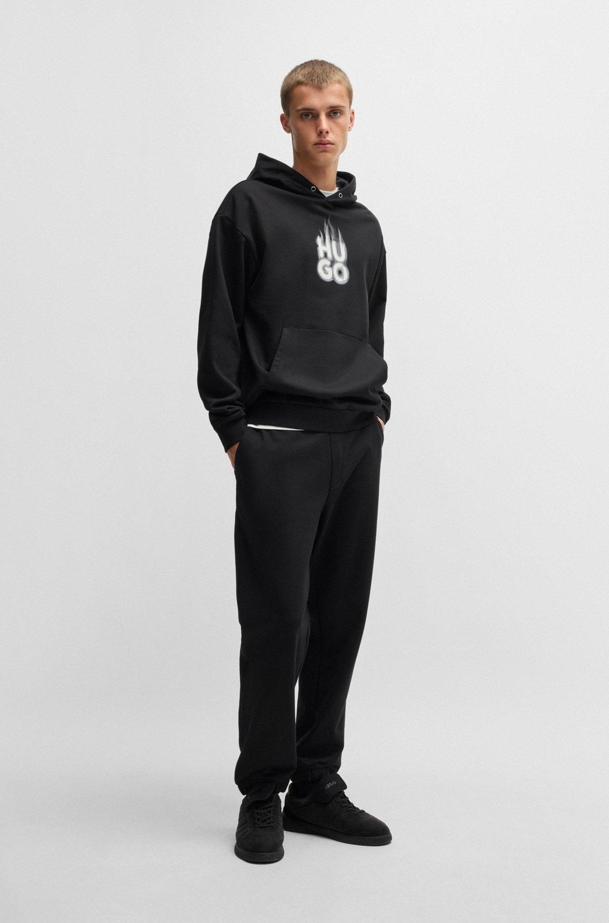 Cotton-terry tracksuit bottoms with smoke logo Product Image