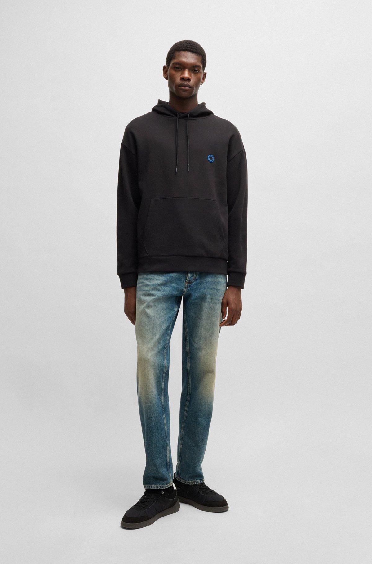 Cotton-terry hoodie with Happy HUGO logo Product Image