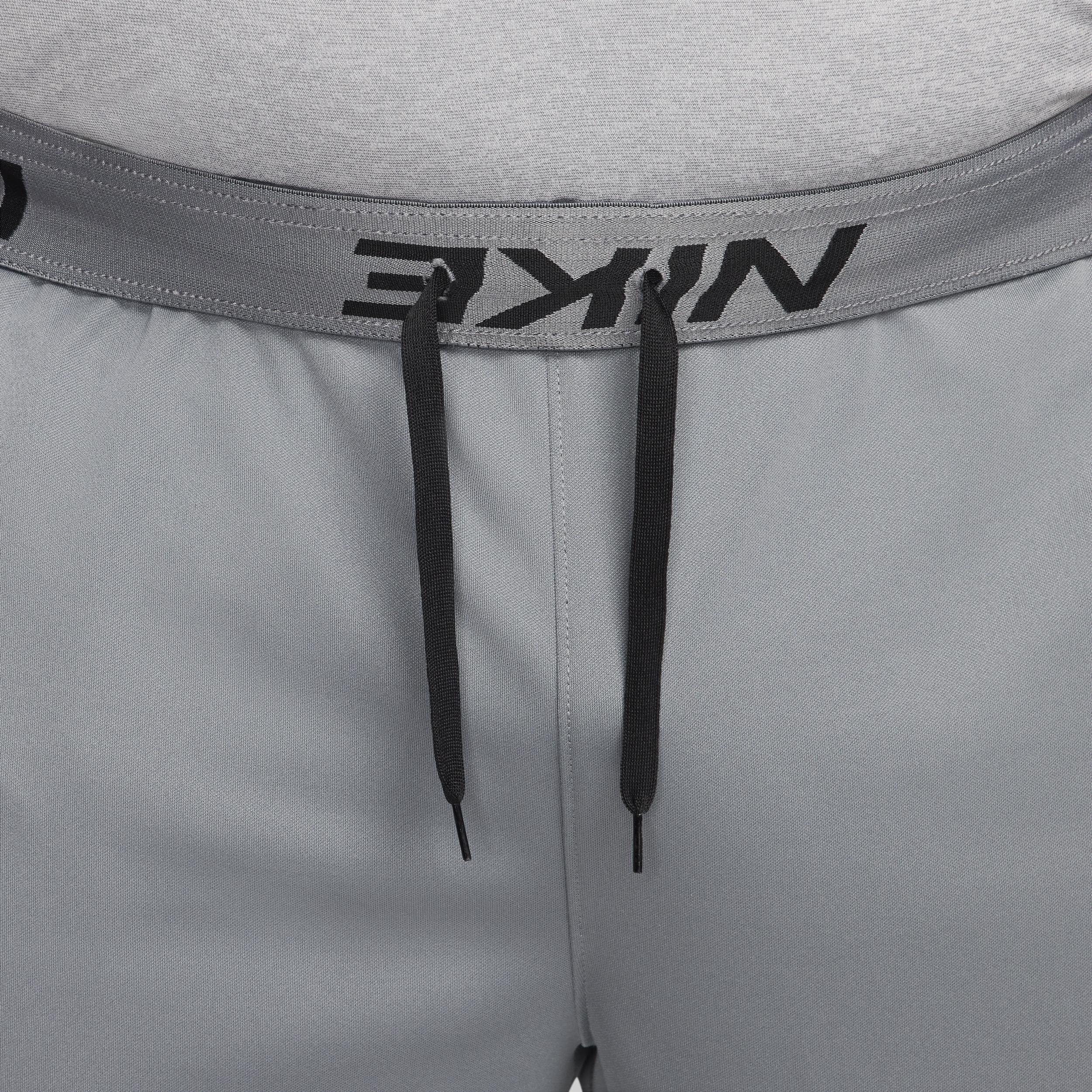 Nike Mens Totality Dri-FIT Tapered Versatile Pants | FB7509-084 Product Image