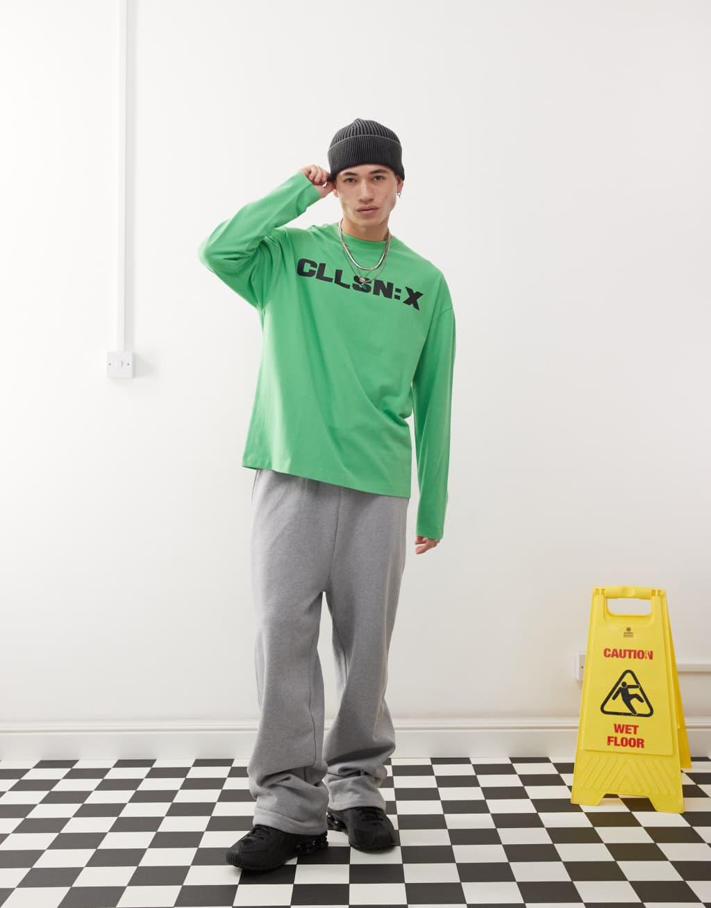 COLLUSION long sleeve logo tour graphic t-shirt in green Product Image