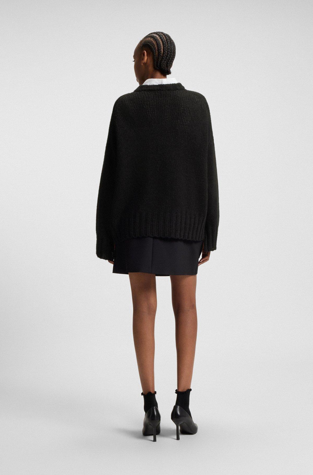 Oversize-fit knitted sweater with embroidered logo Product Image