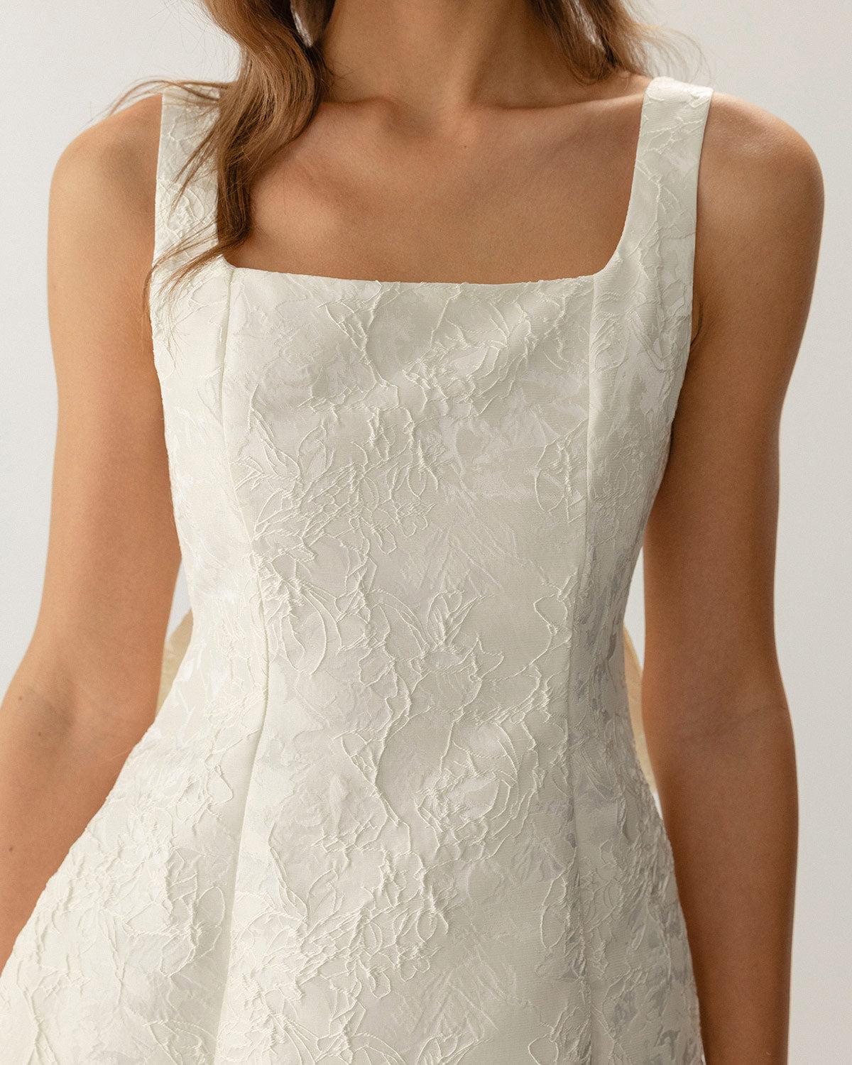 White Textured Bowknot Slip Mini Dresses Product Image