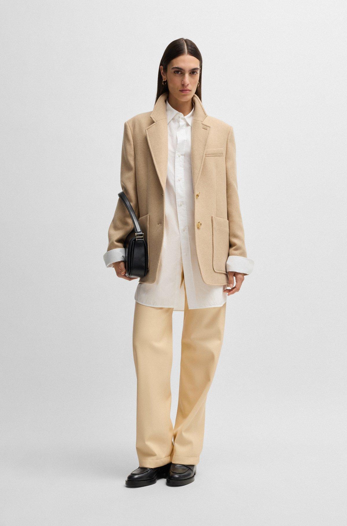 Five-pocket trousers in faux leather Product Image