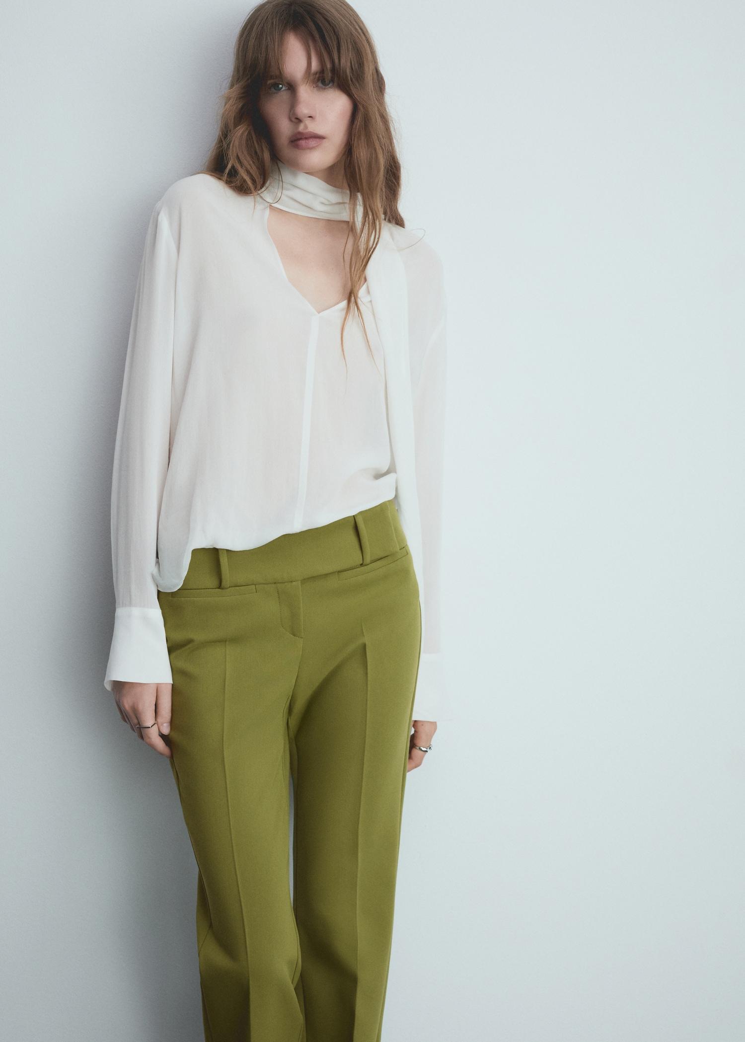 Low-rise flared pants - Women | MANGO USA Product Image