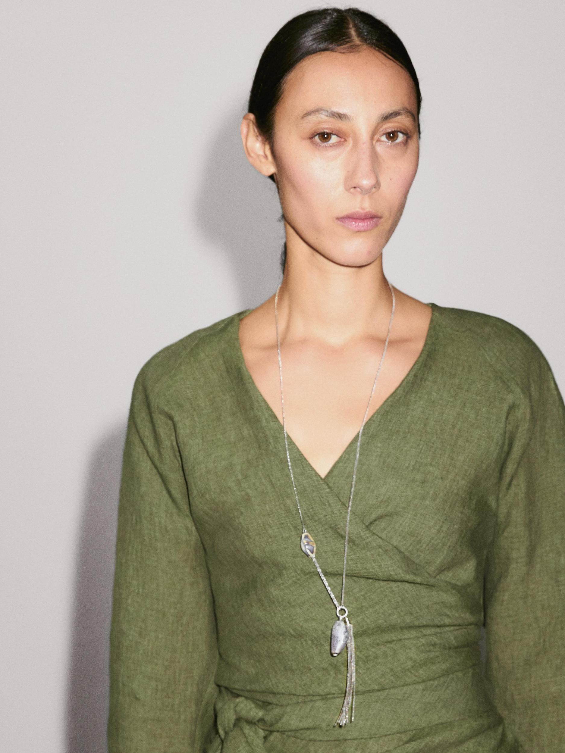 Flowing linen blouse with tie detail at the waist Product Image