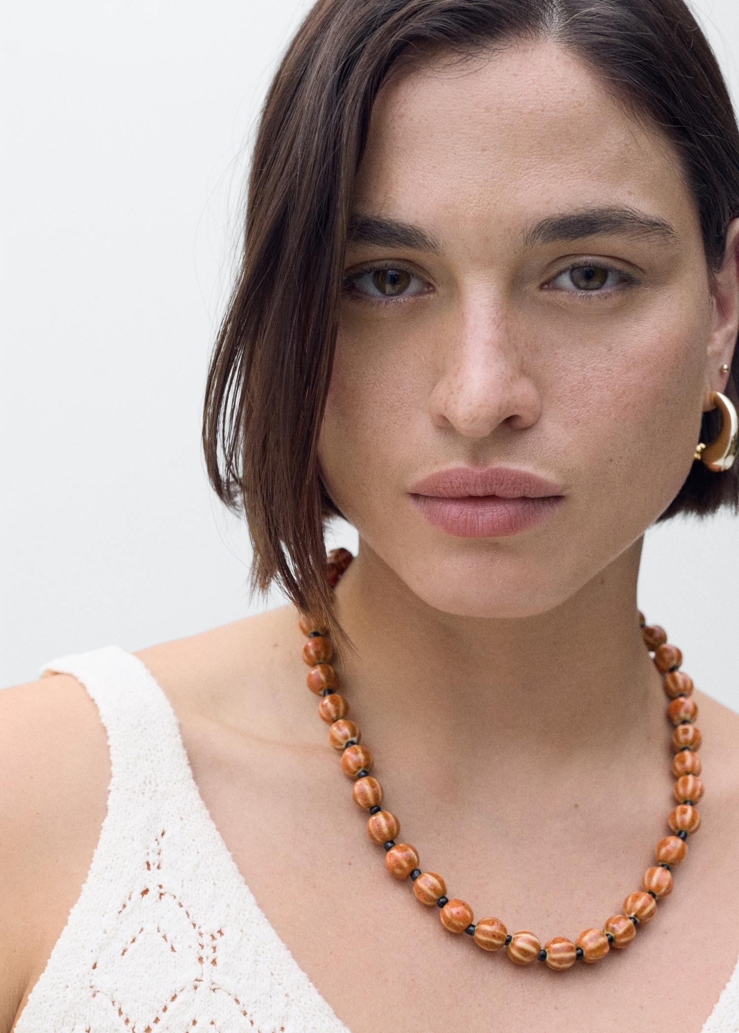 Openwork details knit top - Women | MANGO USA Product Image