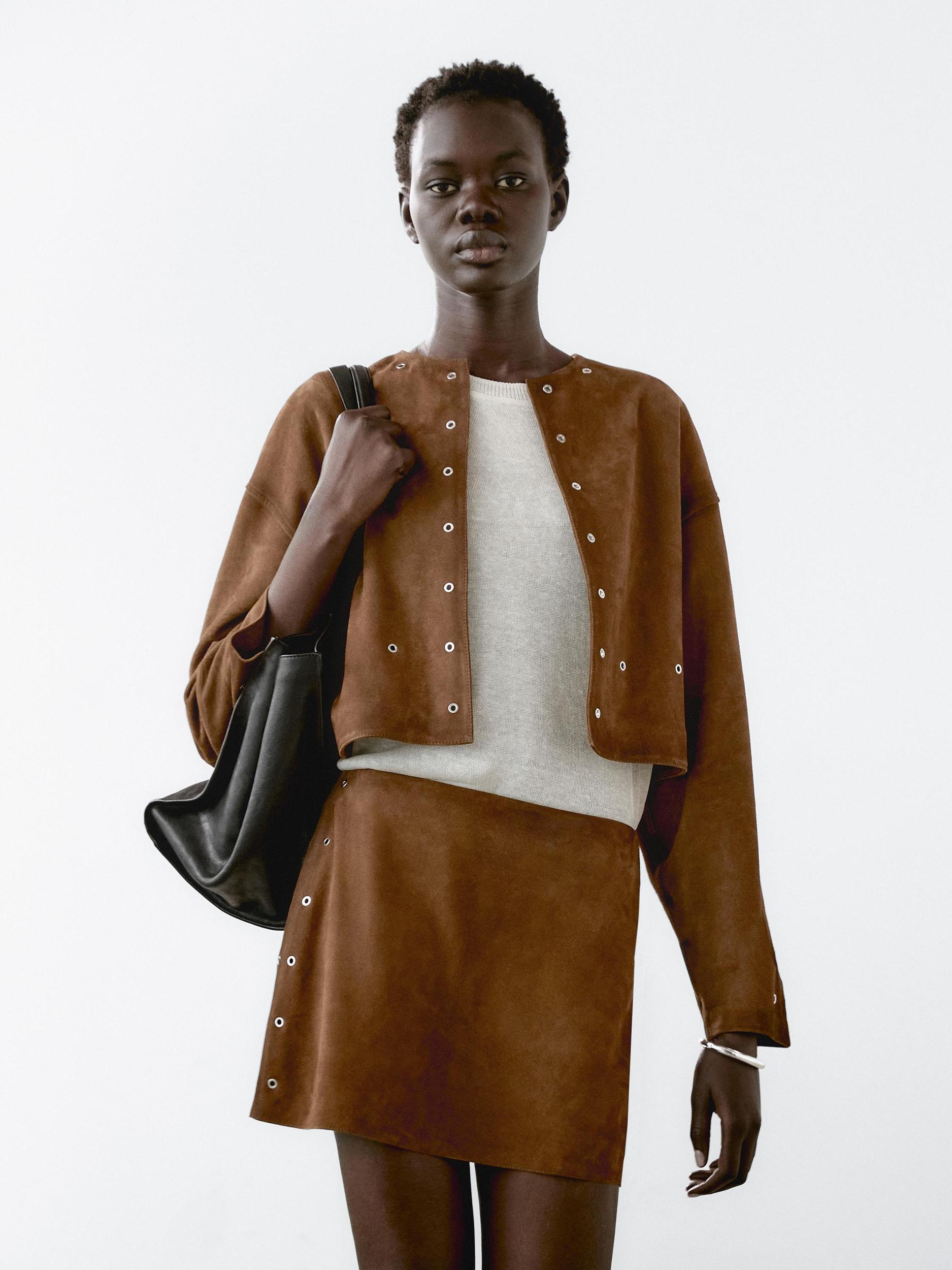 Suede leather jacket with eyelets Product Image