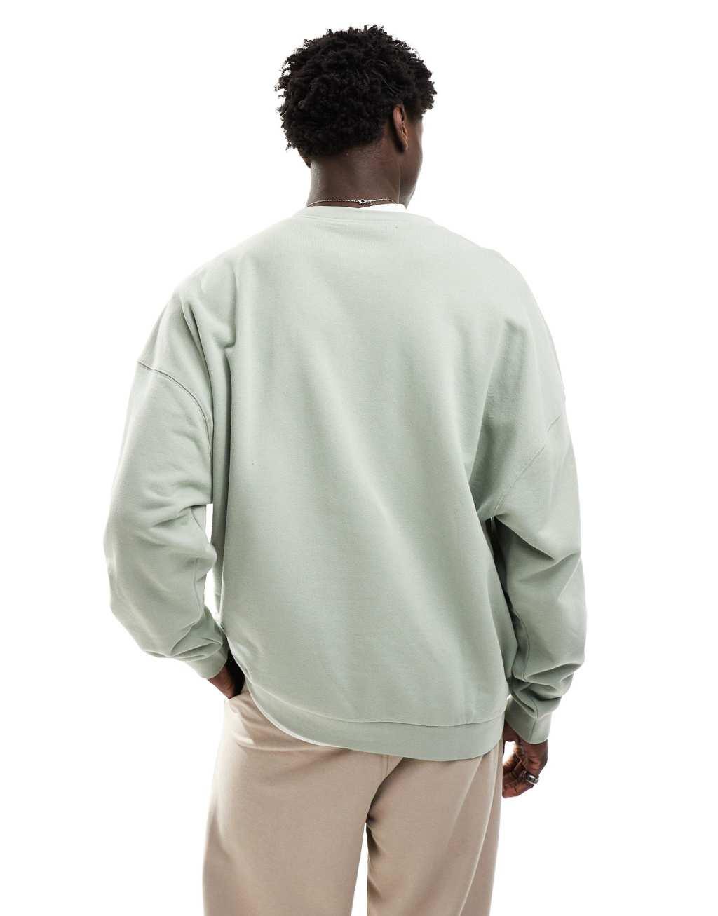 Nike Club french terry oversized sweatshirt in olive Product Image