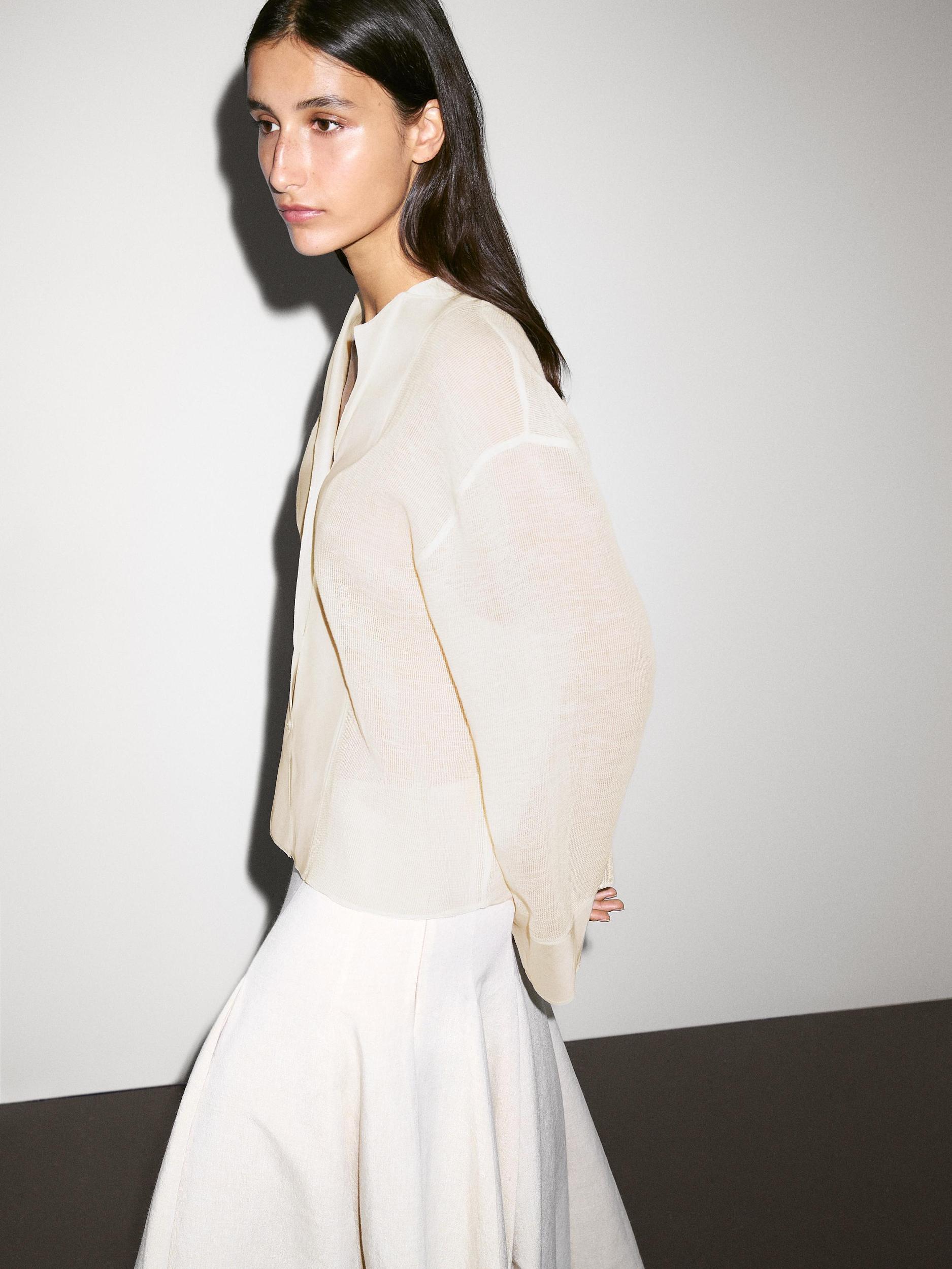 Cotton blend blouse with fabric detail Product Image