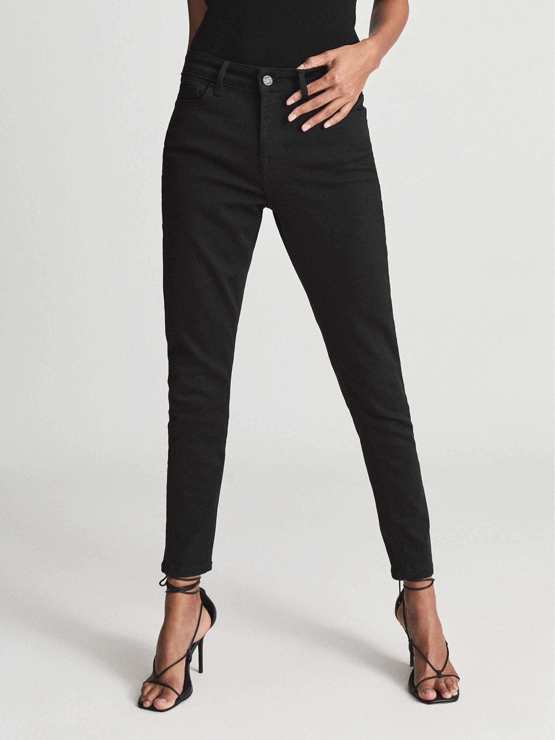 Mid Rise Skinny Jeans in Black Product Image