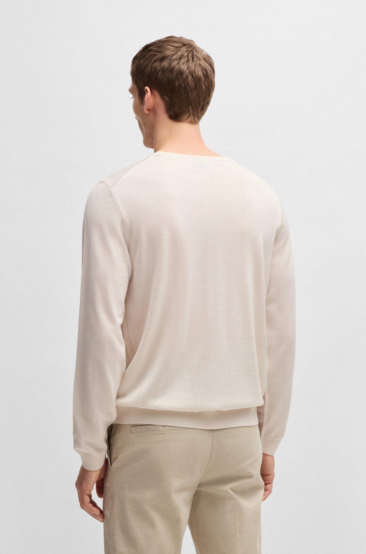 Slim-fit sweater in merino wool with crew neckline Product Image