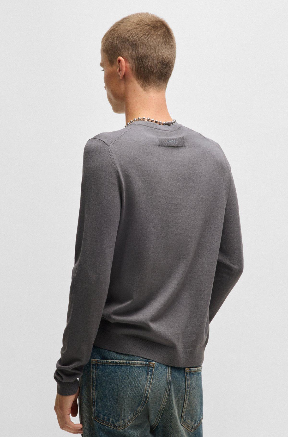 Relaxed-fit knitted sweater with V neckline Product Image